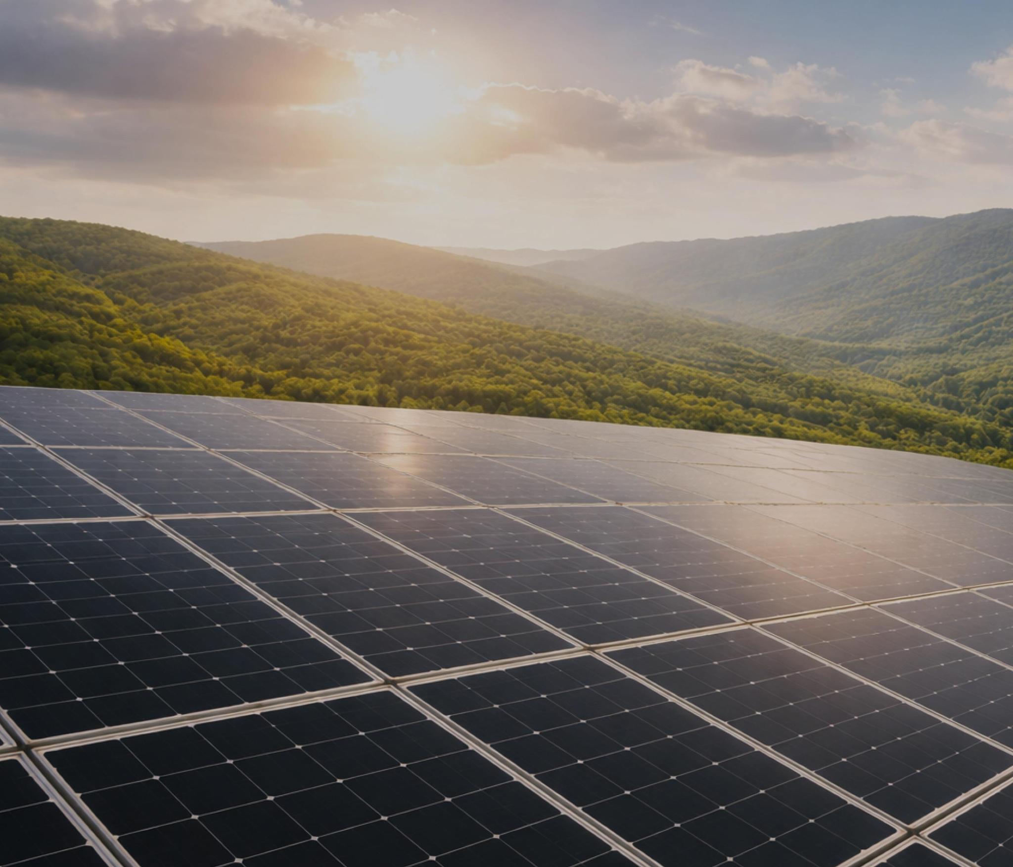 Solar panels overlooking green hills